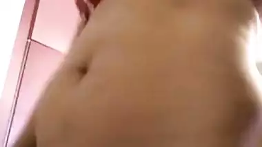 Half-naked Desi woman shows off her sex red lingerie on the XXX camera