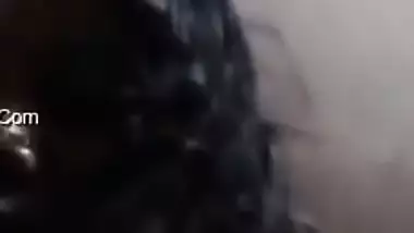 Desi mom with serious face sits before camera topless in solo sex clip