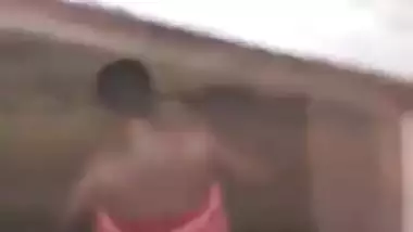 Voyeur can't take eyes off Desi girl taking a XXX shower outdoors