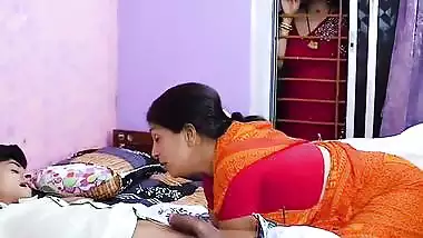Indian porn of a mom getting horny watching her son fucking
