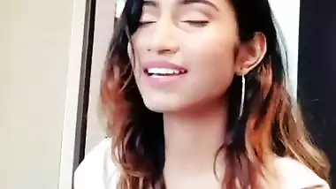 Sexy desi babe singing showing her hot clevage
