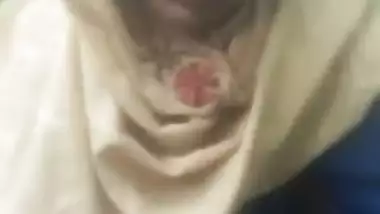 Sexy Desi Dehati beauty shows her shaved XXX pussy in outdoor MMS clip