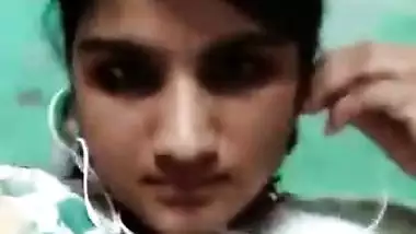 Busty Desi girl pulls T-shirt up exposing her XXX boobies and sex opening