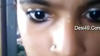 Indian teen with big eyes and pierced nostril shows what she has got