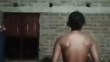 Village girl applying lotion to full nude body