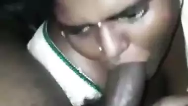 Mature lady gives a blowjob to her owner in Telugu porn