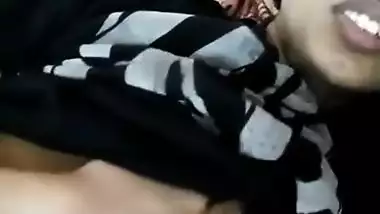 Young Indian woman with big sex eyes flashes her XXX tits in bed