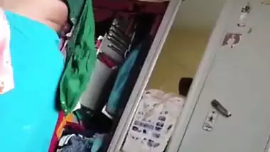 Grandmother wearing blouse and showing naked boobs