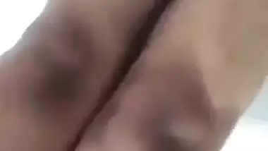 Beautiful desi girl lifting top to reveal sexy boobs