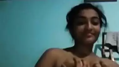 Indian love allows her sex fans to see these XXX melons under a fan