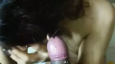 Indian bikini girl in glasses gives blowjob to boyfriend