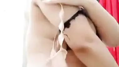 Selfie MMS clip of Desi girl with juicy tits performing XXX striptease