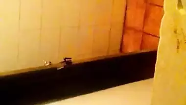 Girl spying on her stepmom having nude bath