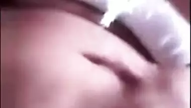 Indian chick in a red robe bares her natural XXX breasts to the sex fan